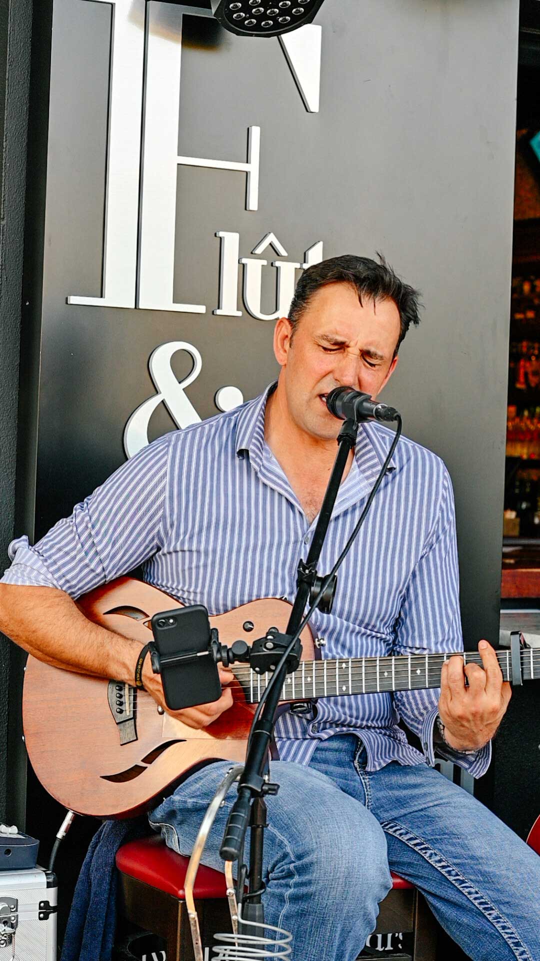 Singer at Flute & Dram on Beach Drive in downtown St. Petersburg