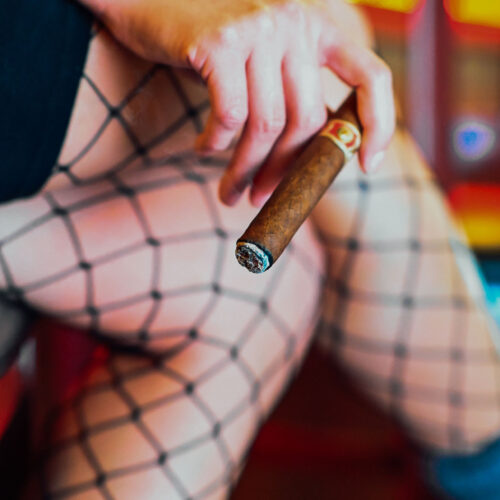 smoking cigar at Ruby's Elixir and Central Cigars in downtown St. Petersburg, FL