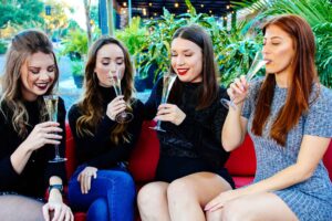 Drinking champagne on outdoor patio at Flute & Dram on Beach Drive in downtown St. Petersburg