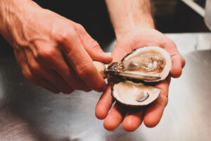 Oyster shuck at the Oyster Bar in downtown St. Petersburg, FL